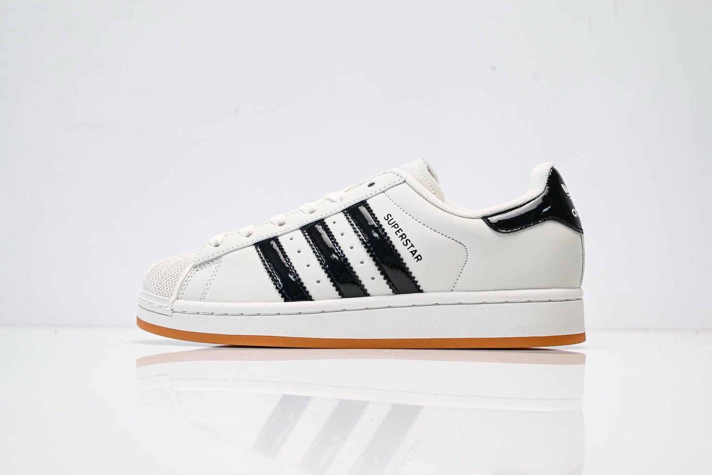adidas Originals Superstar – Off-White Upper with Black Patent Accents & Gum Sole