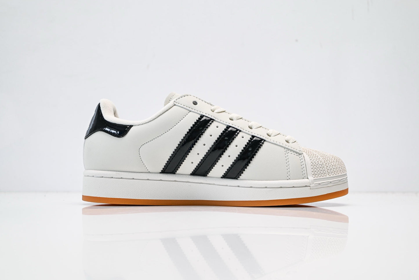 adidas Originals Superstar – Off-White Upper with Black Patent Accents & Gum Sole