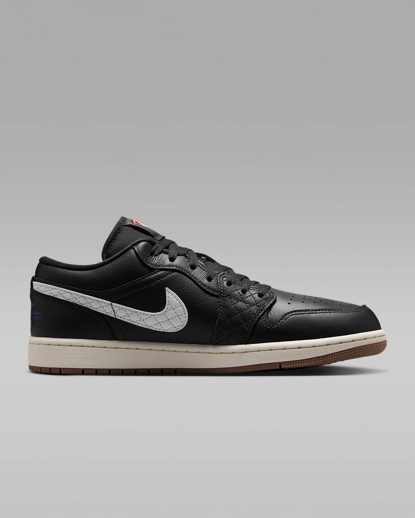 Air Jordan 1 Low Black White Quilted Swoosh Gum Outsole Leather Sneakers