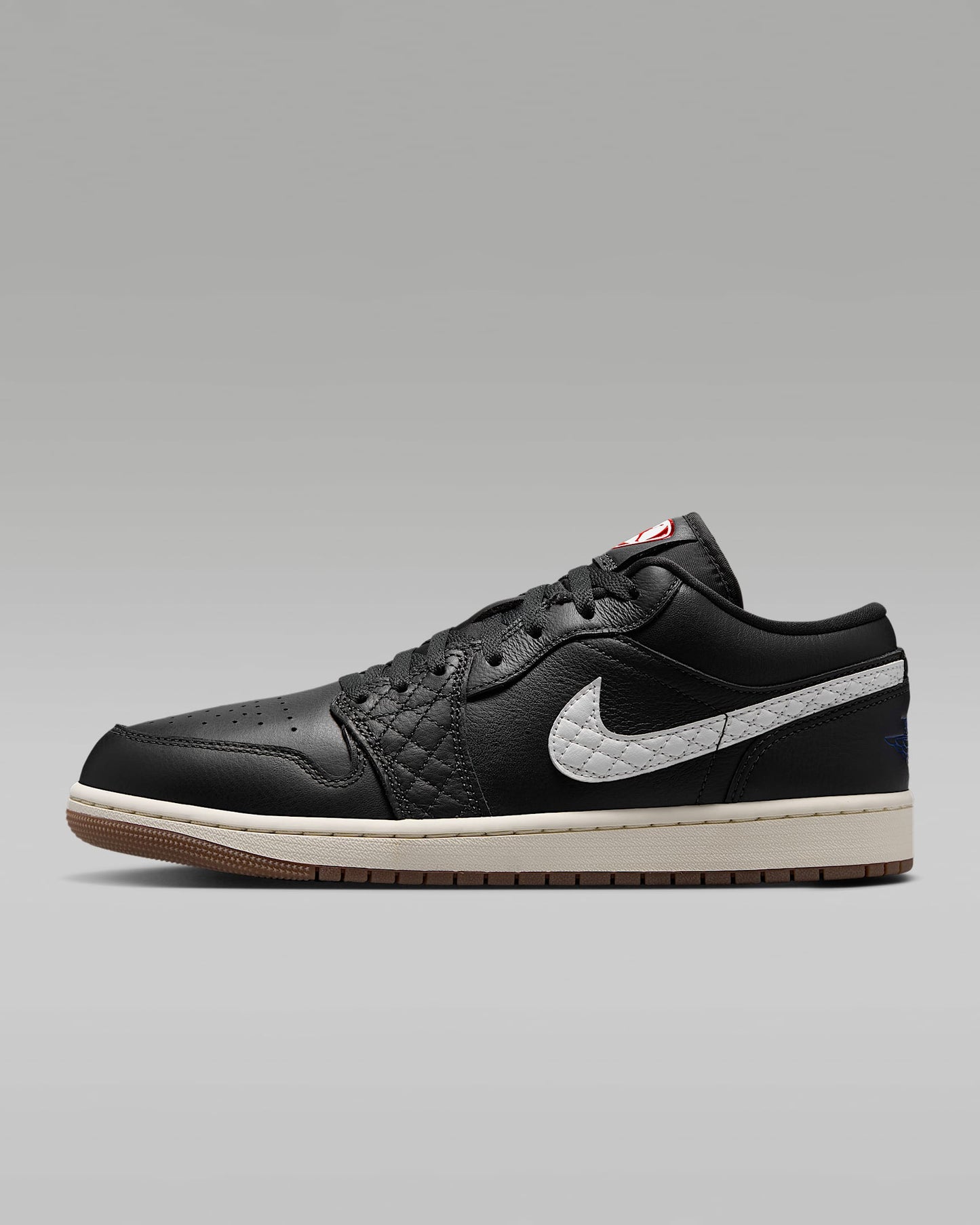Air Jordan 1 Low Black White Quilted Swoosh Gum Outsole Leather Sneakers