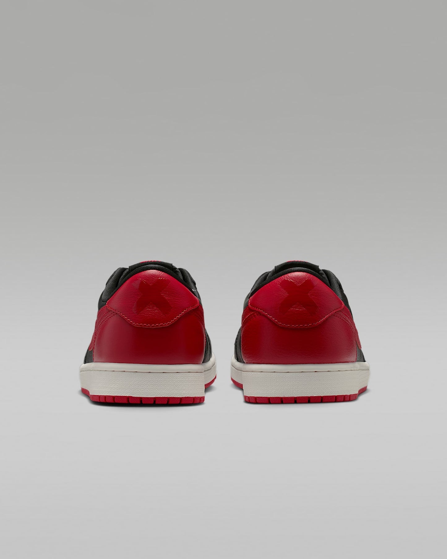 Air Jordan 1 Retro Low OG "Banned" Black and Varsity Red Sneakers