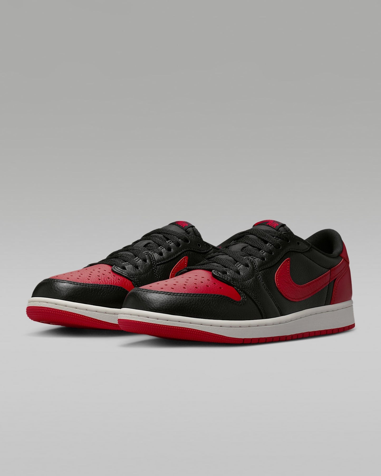 Air Jordan 1 Retro Low OG "Banned" Black and Varsity Red Sneakers