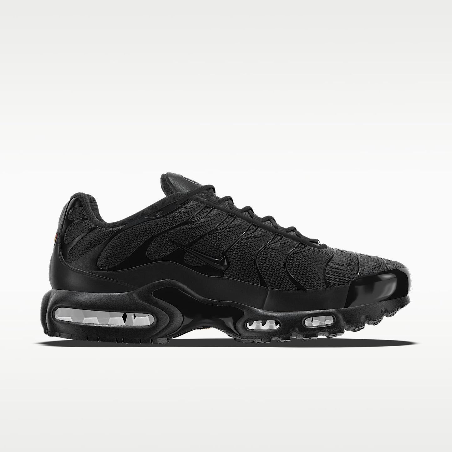 Nike Air Max Plus — Triple Black