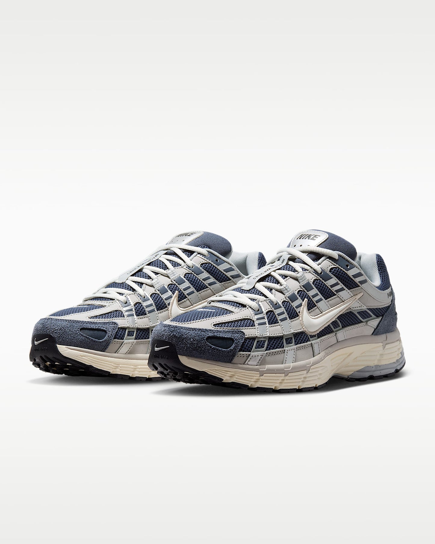 Nike P-6000 – Navy / Beige / Grey Mesh Athletic Sneakers