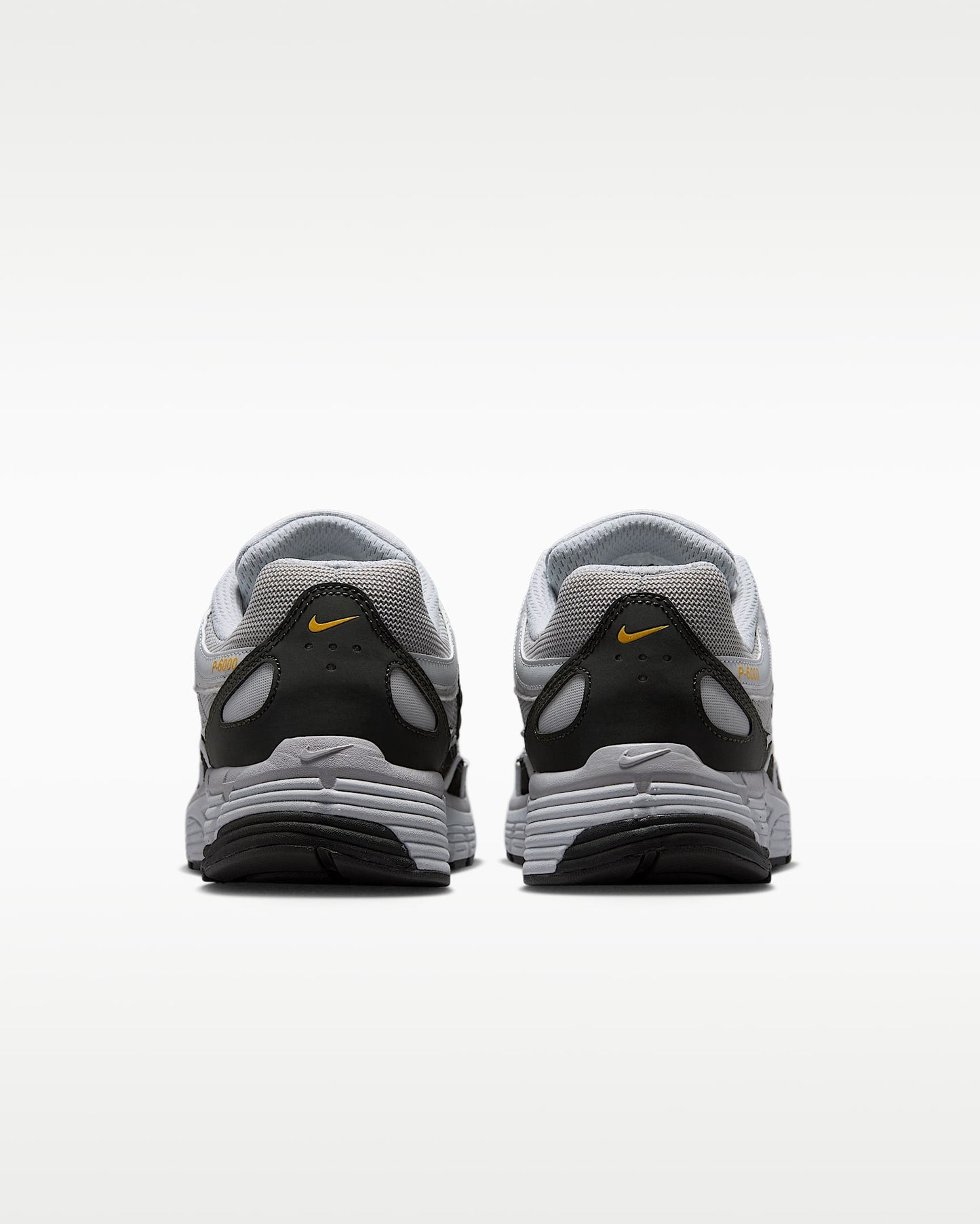 Nike P-6000 – Grey / Black / Orange Mesh Athletic Sneakers