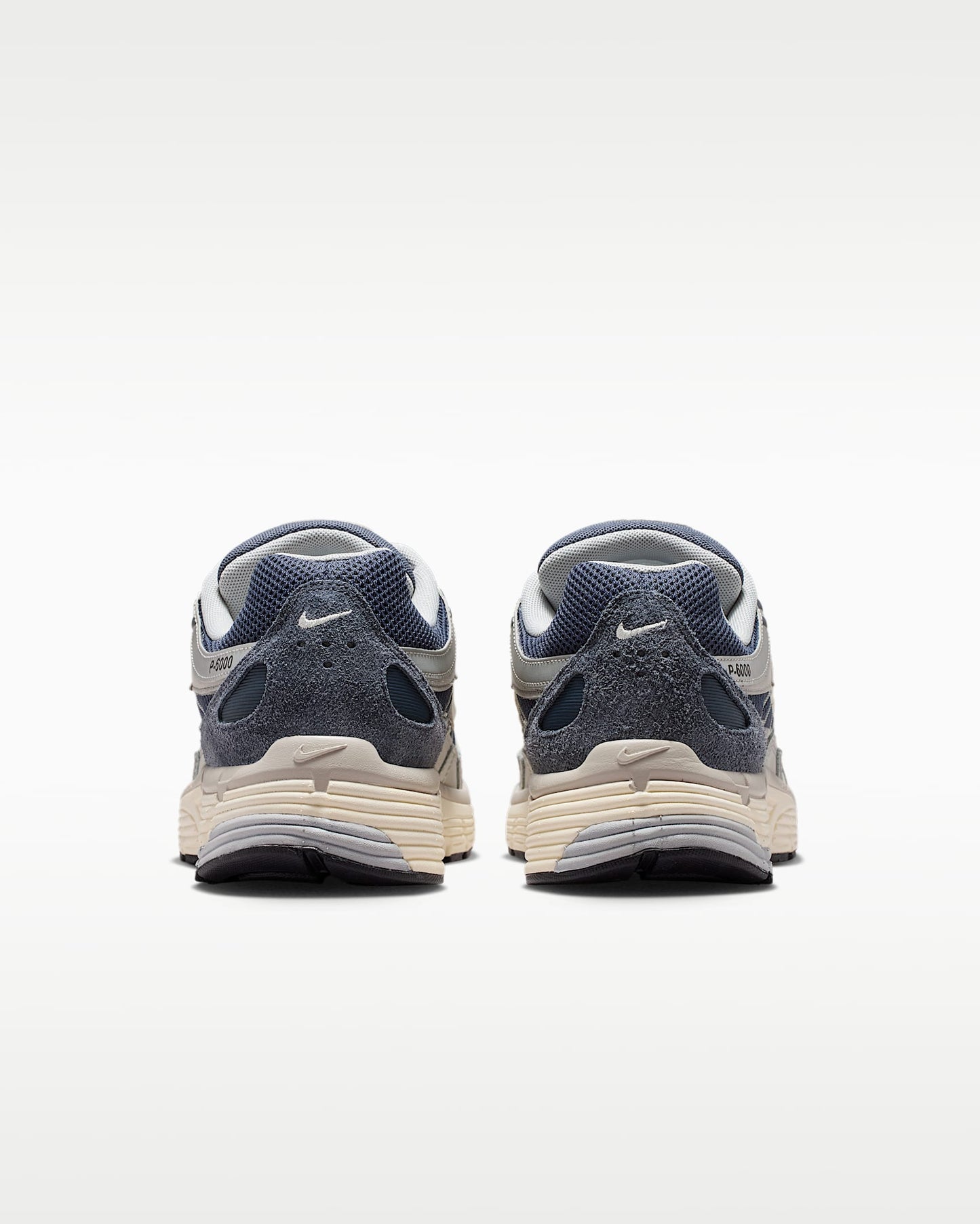 Nike P-6000 – Navy / Beige / Grey Mesh Athletic Sneakers
