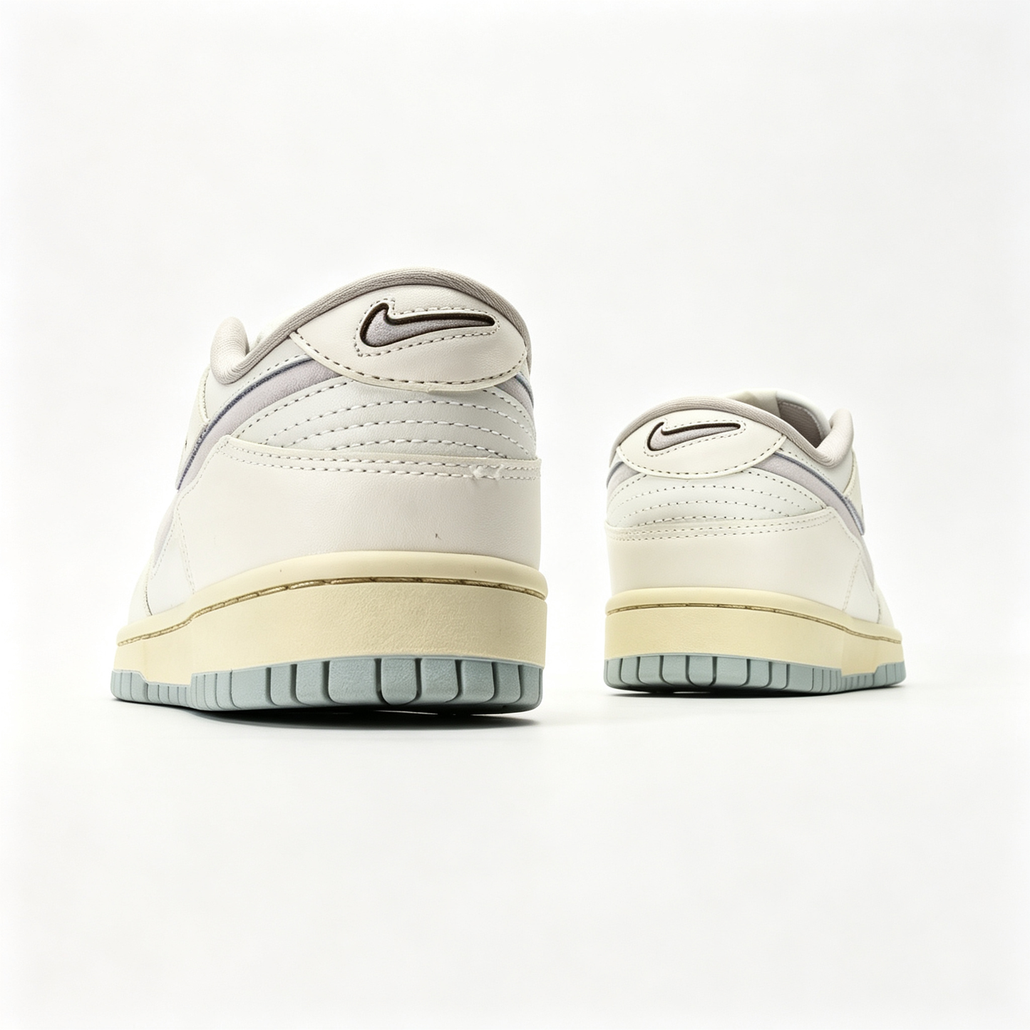 Nike Dunk Low — Cream / Off-White / Light Grey Swoosh / Pale Blue Outsole